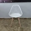 Mesh Eames Chair White Mesh Eames Chair White in a modern office workspace