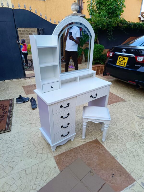 Modern White Dressing Table with 3-Mode Touch LED Mirror and Stool Set Modern dressing table with lighted mirror in a stylish bedroom setup