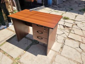 Modern office desk with durable wooden top and sturdy frame
