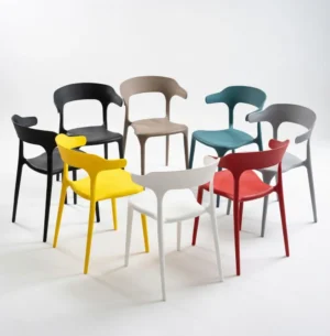 Plastic Cafe Chairs – Durable Outdoor and Indoor Seating Modern stackable plastic cafe chairs arranged on a sunny outdoor patio