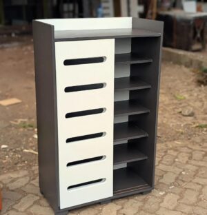 Modern sliding door shoerack with multiple shelves and sleek wooden finish
