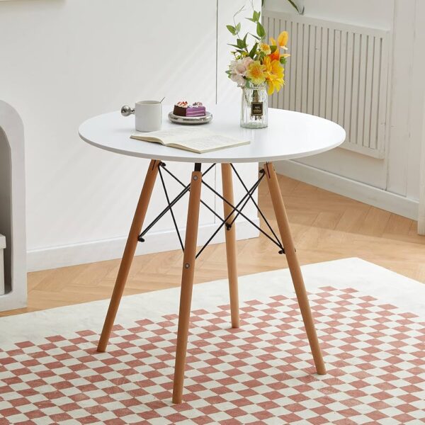 White Round Dining Table for Modern Dining Spaces White Round Dining Table with modern design for dining rooms and stylish interiors